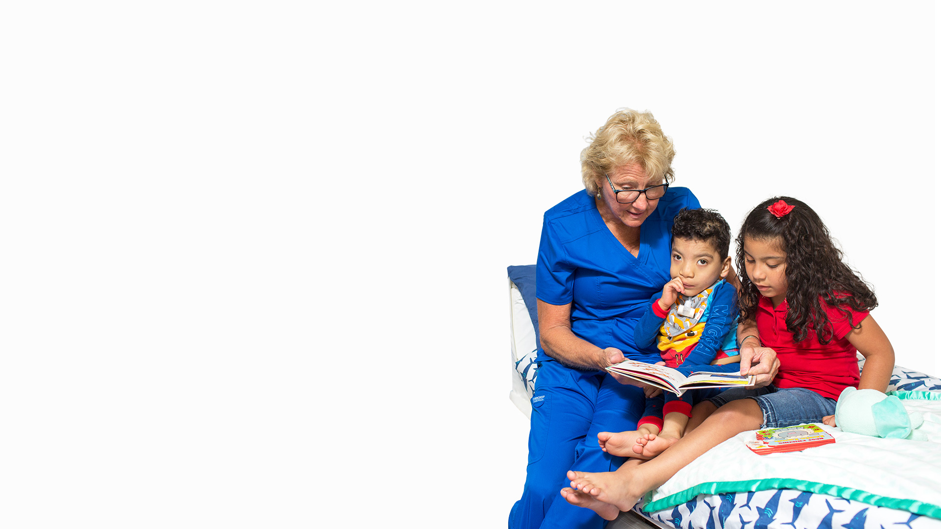caregiver-reading-to-kids2